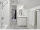 Bright bathroom featuring white tile, a large vanity, and modern fixtures at 3814 Vermont Ne Rd, Atlanta, GA 30319
