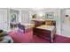 Inviting bedroom with two twin beds, a window nook, and built-in shelving at 3814 Vermont Ne Rd, Atlanta, GA 30319
