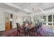 Bright formal dining room featuring a chandelier, large window, and hardwood floors at 3814 Vermont Ne Rd, Atlanta, GA 30319