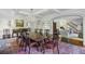 Elegant dining room with chandelier, wooden table, and doorway to the living room at 3814 Vermont Ne Rd, Atlanta, GA 30319