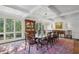 Formal dining room with coffered ceiling, chandelier, and a large window at 3814 Vermont Ne Rd, Atlanta, GA 30319