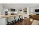 Modern kitchen featuring a large island, stainless steel appliances, and hardwood flooring at 3814 Vermont Ne Rd, Atlanta, GA 30319