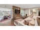 Spacious living room featuring a stone accent wall, hardwood floors, and recessed lighting at 3814 Vermont Ne Rd, Atlanta, GA 30319
