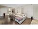 Spacious living room featuring a lounge area, a kitchen, and built-in storage at 3814 Vermont Ne Rd, Atlanta, GA 30319