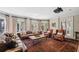 Cozy living room featuring a fireplace, comfortable seating, and an oriental rug at 3814 Vermont Ne Rd, Atlanta, GA 30319
