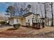Charming home exterior featuring an attached garage, back deck, and bay window for outdoor living and curb appeal at 4614 Blakedale Cir, Roswell, GA 30075