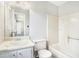 Clean bathroom with tub/shower combination, neutral colors, and a vanity sink at 832 Toonigh Rd, Canton, GA 30115