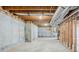 Spacious unfinished basement with concrete walls, exposed beams, and visible ductwork at 1621 Annapolis Way, Grayson, GA 30017