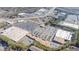 Aerial view highlighting a large commercial area with expansive parking lots and easy access to amenities at 361 Watson Ave, Woodstock, GA 30189