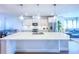 Spacious kitchen with quartz island countertop and stainless-steel appliances at 361 Watson Ave, Woodstock, GA 30189