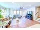 Comfortable living room featuring hardwood floors, fireplace and an exterior door to the balcony at 361 Watson Ave, Woodstock, GA 30189