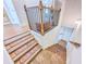 A staircase leads down to the lower level, featuring carpeted steps and iron railings at 361 Watson Ave, Woodstock, GA 30189