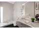 Bathroom featuring a marble countertop vanity and glass shower at 79 Beverly Ne Rd, Atlanta, GA 30309