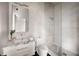 Bathroom featuring a shower with glass doors and a marble countertop vanity at 79 Beverly Ne Rd, Atlanta, GA 30309