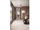 Inviting hallway with a black framed opening, textured walls, and a view to a cozy sitting area at 79 Beverly Ne Rd, Atlanta, GA 30309