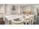 Stylish kitchen island with white marble countertops and modern seating at 79 Beverly Ne Rd, Atlanta, GA 30309