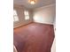 Spacious bedroom with plush carpeting and windows allowing natural light at 7155 Roswell Rd # 37, Sandy Springs, GA 30328