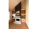 Living room featuring fireplace with marble surround and built-in shelving at 7155 Roswell Rd # 37, Sandy Springs, GA 30328