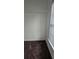 Bright closet featuring a wire shelf for ample storage and brown carpet at 911 Redwood Dr, Norcross, GA 30093