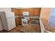 Modern kitchen featuring granite countertops, stainless steel sink, and modern appliances at 911 Redwood Dr, Norcross, GA 30093