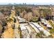 An aerial view of the condominium community close to the city and surrounded by trees at 1106 Hampton Ne Way, Atlanta, GA 30324