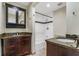Well-lit bathroom with granite countertops, dual vanities, and tiled shower at 1106 Hampton Ne Way, Atlanta, GA 30324