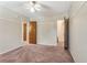 Spacious bedroom with plush carpeting and an ensuite bathroom and closet at 1106 Hampton Ne Way, Atlanta, GA 30324