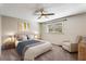 Serene bedroom with neutral tones, plush carpeting, and a calming view from the window at 1106 Hampton Ne Way, Atlanta, GA 30324
