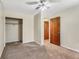 Inviting bedroom featuring neutral tones, plush carpeting and a walk-in closet at 1106 Hampton Ne Way, Atlanta, GA 30324