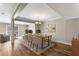 Cozy dining room adjacent to living room, with neutral paint and wood floors at 1106 Hampton Ne Way, Atlanta, GA 30324
