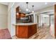 Open kitchen area with granite counter top bar overlooking the dining and living spaces at 1106 Hampton Ne Way, Atlanta, GA 30324
