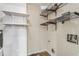 This laundry room offers shelving, an electrical outlet and a water heater at 1106 Hampton Ne Way, Atlanta, GA 30324