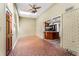 Bright sunroom with unique brick floor and skylight, leading to the kitchen with a breakfast bar at 1106 Hampton Ne Way, Atlanta, GA 30324