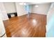 Expansive living room showcasing hardwood floors, stylish lighting, and a built-in desk area at 265 Edinburgh Ln, Woodstock, GA 30188