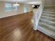 Spacious living area with hardwood floors, abundant natural light, and an open floor plan at 265 Edinburgh Ln, Woodstock, GA 30188