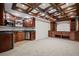 Finished basement area featuring a wet bar and custom shelving at 403 Glenhurst Trce, Canton, GA 30115