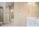 Well-lit bathroom with a glass shower and tiled floors at 403 Glenhurst Trce, Canton, GA 30115