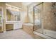 Spacious bathroom with a tiled shower, jetted tub, and window at 403 Glenhurst Trce, Canton, GA 30115