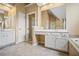 Bathroom features double sinks, white cabinetry, and tile floors at 403 Glenhurst Trce, Canton, GA 30115