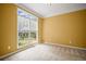 A bright and airy bedroom with a neutral color palette and ample natural light at 403 Glenhurst Trce, Canton, GA 30115