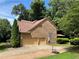 Spacious two-car garage with basketball hoop and a well-maintained driveway at 403 Glenhurst Trce, Canton, GA 30115