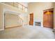 Inviting living room featuring a fireplace and built-in shelving for storage and display at 403 Glenhurst Trce, Canton, GA 30115