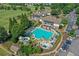 An aerial view of the large community pool with pool-side seating at 403 Glenhurst Trce, Canton, GA 30115
