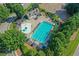 An aerial view of the pool and pool with shaded seating at 403 Glenhurst Trce, Canton, GA 30115