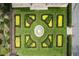 Aerial view of a manicured garden with geometric patterns and a central fountain, lush landscaping at 4975 Rebel Trl, Atlanta, GA 30327