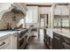 Gourmet kitchen with a large island, professional-grade appliances, and custom details at 4975 Rebel Trl, Atlanta, GA 30327