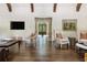 Spacious living room featuring hardwood floors, comfortable seating, and a seamless transition to other areas at 4975 Rebel Trl, Atlanta, GA 30327