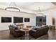 Elegant living room features hardwood floors, recessed lights, and stylish furniture and decor at 4975 Rebel Trl, Atlanta, GA 30327