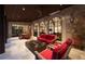 Inviting outdoor patio with stone flooring, a fire pit, and cozy seating area at 4975 Rebel Trl, Atlanta, GA 30327