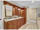 Bathroom features a double sink vanity with cabinets and a walk-in shower at 775 Mountain View Nw Ter, Marietta, GA 30064